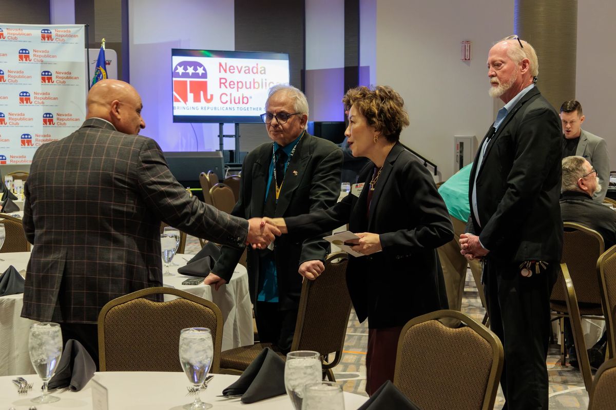 A welcome handshake at a Nevada Republican Club event